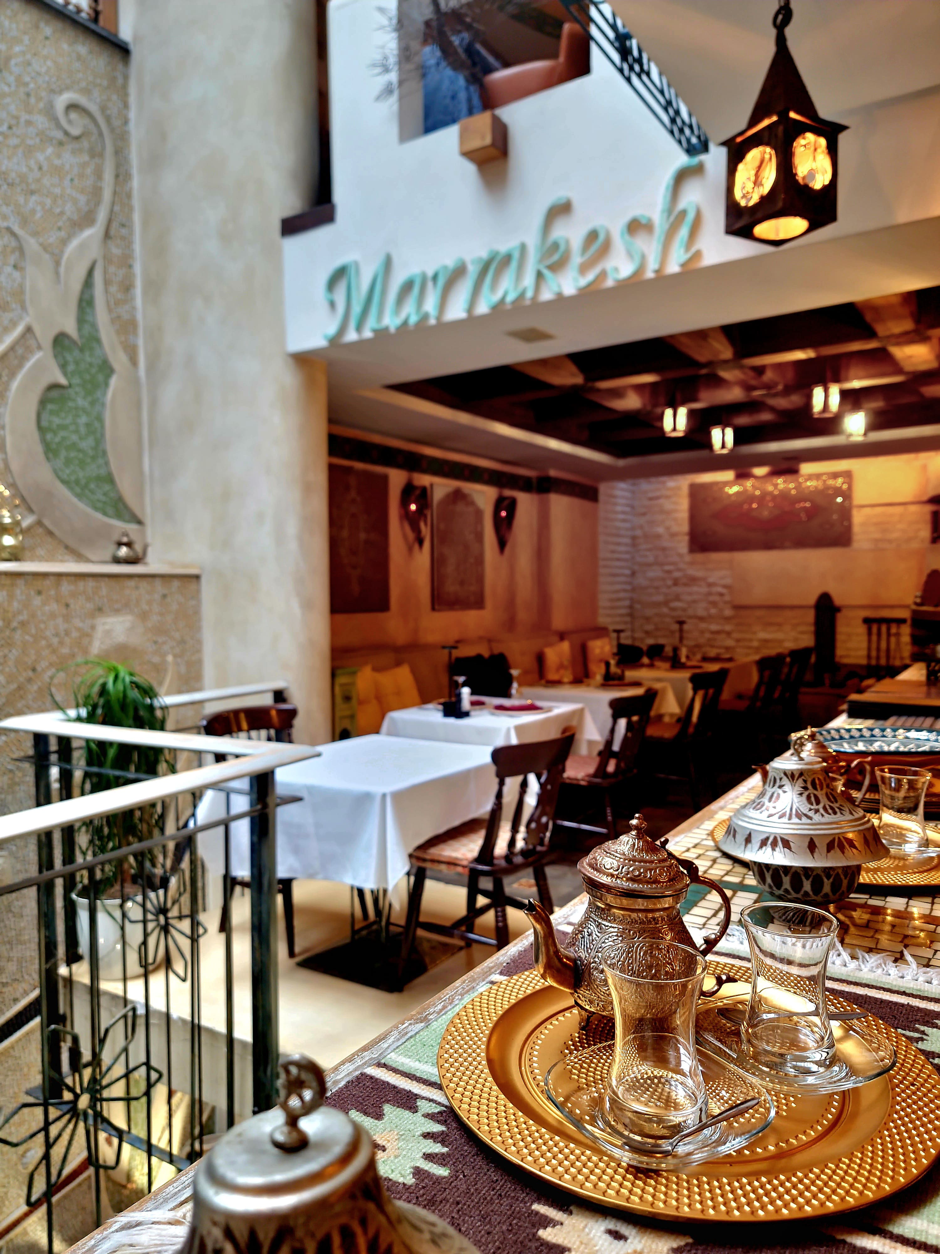 Marrakesh sign and Moroccan tea set