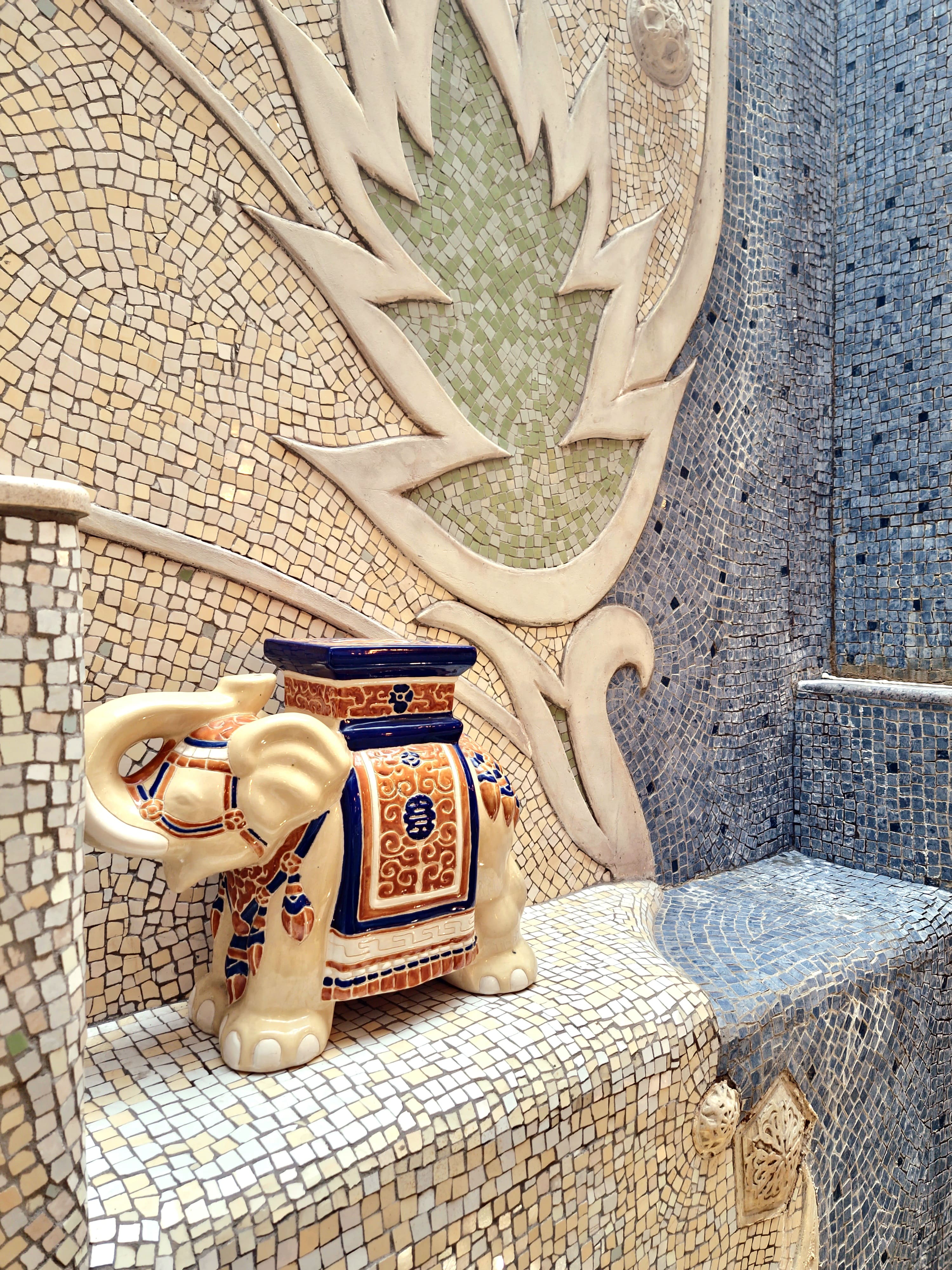Mosaic seat with ceramic elephant
