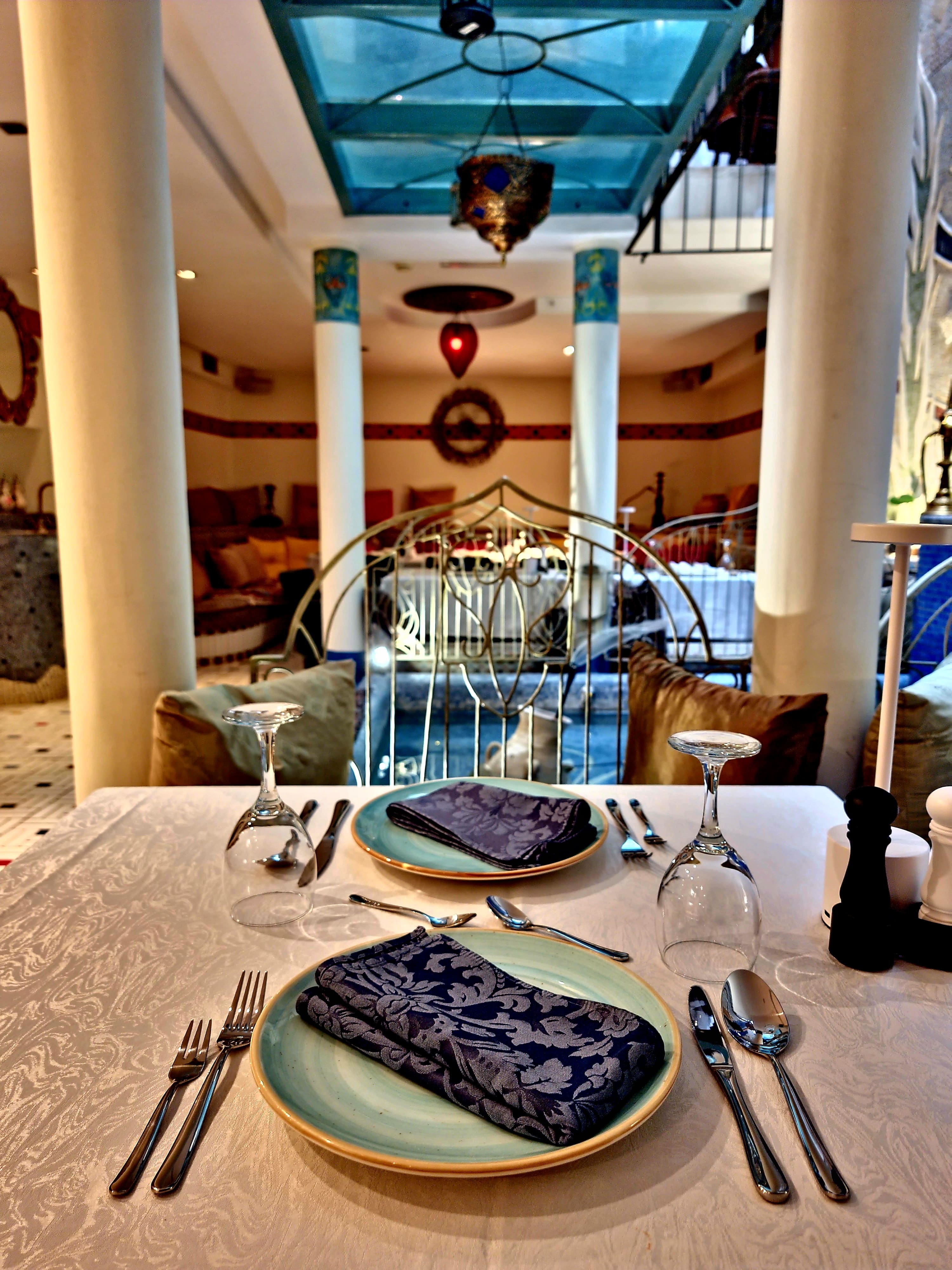 Table set for dinner with view of fountain area