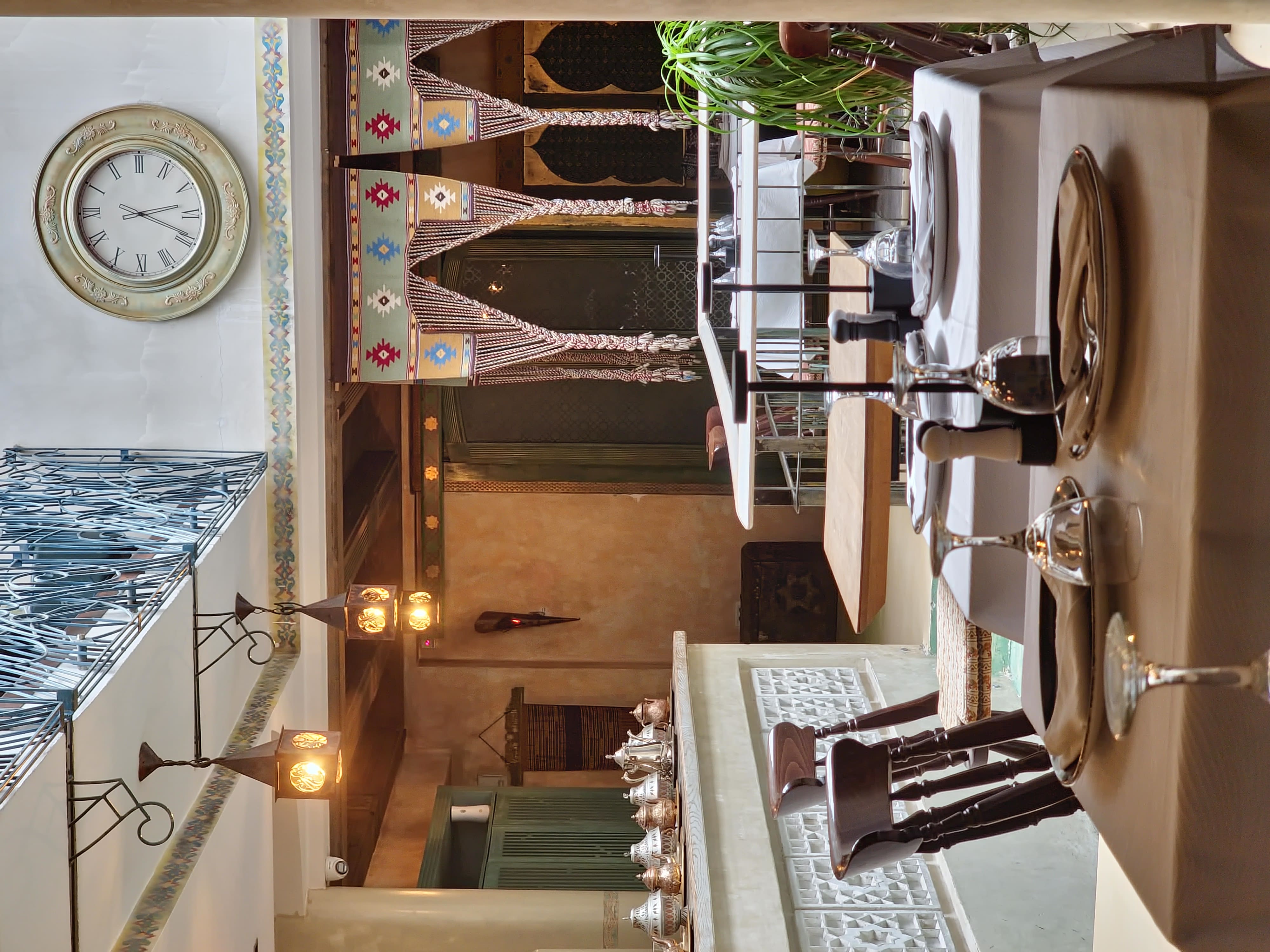 Marrakesh sign on the ground floor of Restoran Maroko, with Moroccan tea set